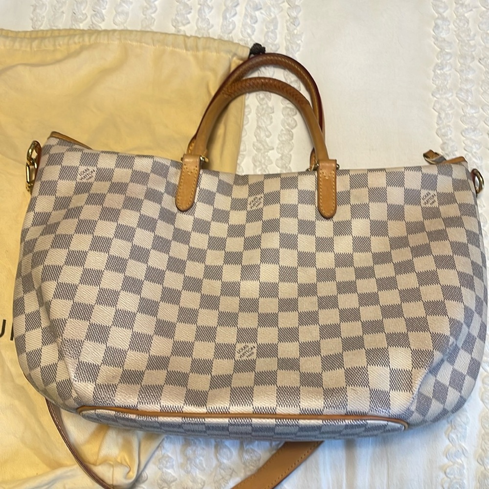 Authentic Louis Vuitton crème and grey gentle used